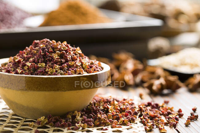 Chinese peppercorns in bowl, close up shot — Stock Photo