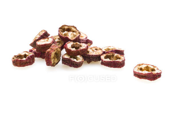 Traditional Chinese medicine, dried hawthorn berries slices — Stock Photo