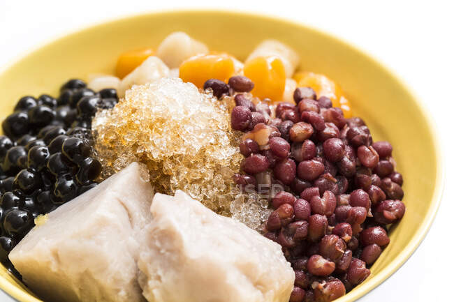 Sweet chinese food, bowl with tapioca and brown sugar — Stock Photo