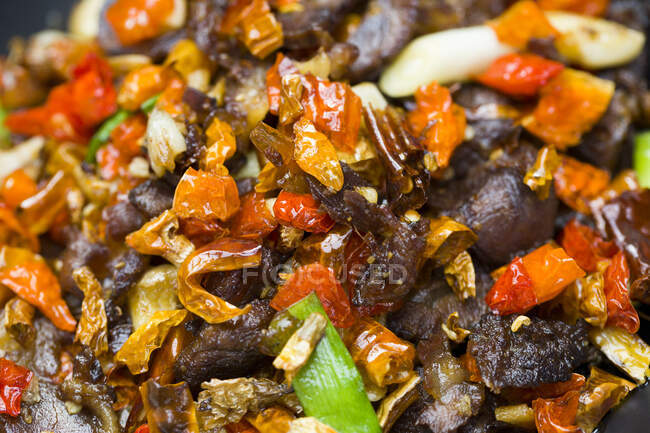 Chinese cuisine, beef with chili, close up shot — Stock Photo