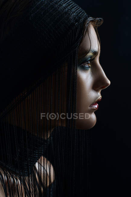 Profile of woman with fashion makeup and hairstyle — Stock Photo