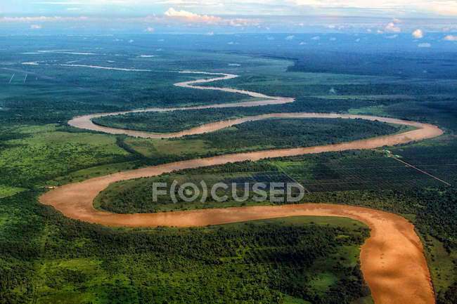 Muddy brown river Borneo — Stock Photo