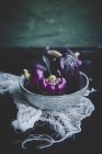 Fresh ripe purple peppers in bowl — Stock Photo