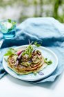 Tasty pancakes and healthy vegetables — Stock Photo