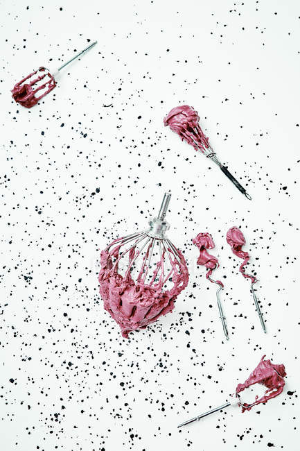 Pink cream on whisk — Stock Photo