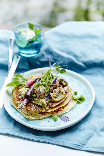 Tasty pancakes and healthy vegetables — Stock Photo