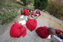 Novice monks children studying — Stock Photo