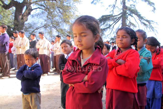 Little girls on morning prayer — Stock Photo