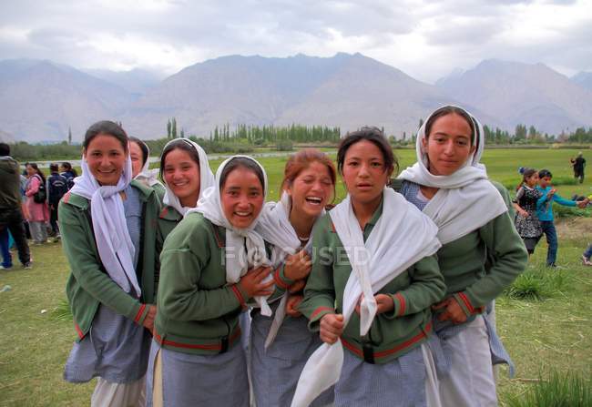 Girls smiling at camera — Stock Photo
