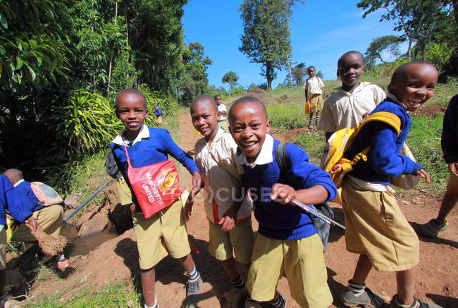 Children smiling at camera and having fun — Stock Photo