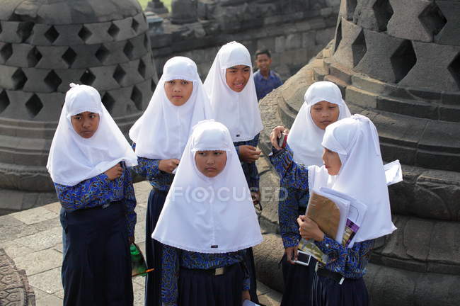 Girls in hijab looking at camera — Stock Photo