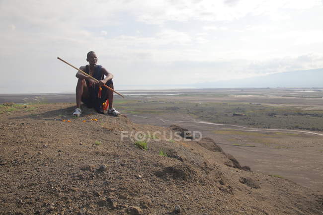 Young Masai man herd in Tanzania , Africa. — Stock Photo