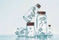 Paper clouds in jars — Stock Photo