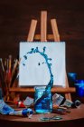 Painting blue  waves in jar — Stock Photo