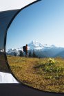 View from tent of man hiking — Stock Photo