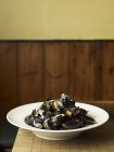Traditional dish of steamed mussels — Stock Photo