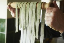 Mature man making fresh pasta — Stock Photo