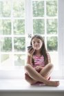 Girl playing with smart phone. — Stock Photo