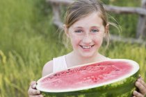 Girl holding water melon. — Stock Photo