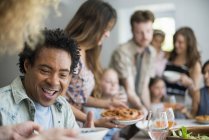 Family gathering for a meal — Stock Photo
