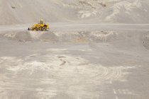 Tractor in a gravel pit. — Stock Photo