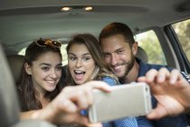 Group of people inside a car — Stock Photo