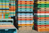 Stacks of multi-colored containers — Stock Photo