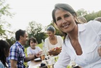 Picnic or buffet in the early evening. — Stock Photo