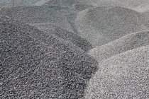 Gravel piles for road maintenance — Stock Photo