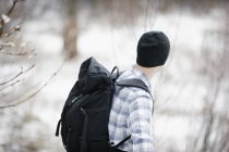 Male hiker in the mountains with backpack — Stock Photo