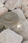 Wide brimmed hat on rock. — Stock Photo