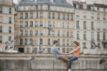 Couple over the River Seine. — Stock Photo