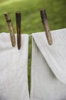Washing line with household linens — Stock Photo