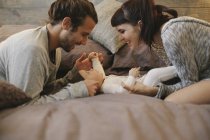 Mother, father and baby together — Stock Photo