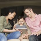Man and woman with their young son — Stock Photo