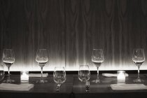 Table set with wine glasses — Stock Photo