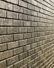 Muro di mattoni marrone — Foto stock