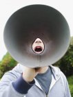 Man using a megaphone — Stock Photo