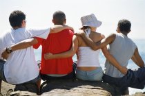 Back view of four friends — Stock Photo