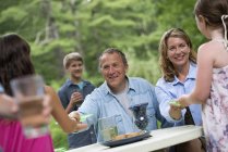 Outdoor family party and picnic. — Stock Photo