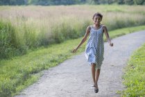 Girl in a summer dress — Stock Photo