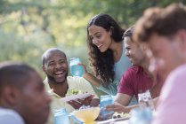 People having meal outdoors — Stock Photo