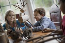 Children with twig reindeer — Stock Photo