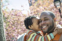 Father and son in park — Stock Photo