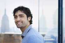 Man with black curly hair — Stock Photo