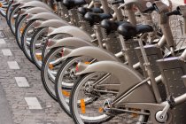 Bicycles in row for rent — Stock Photo