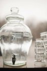 Water in a large clear glass container. — Stock Photo