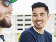 Two smiling young men. — Stock Photo