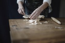 Woman making pie dish — Stock Photo
