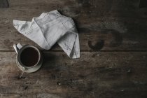 Cup of coffee and napkin — Stock Photo